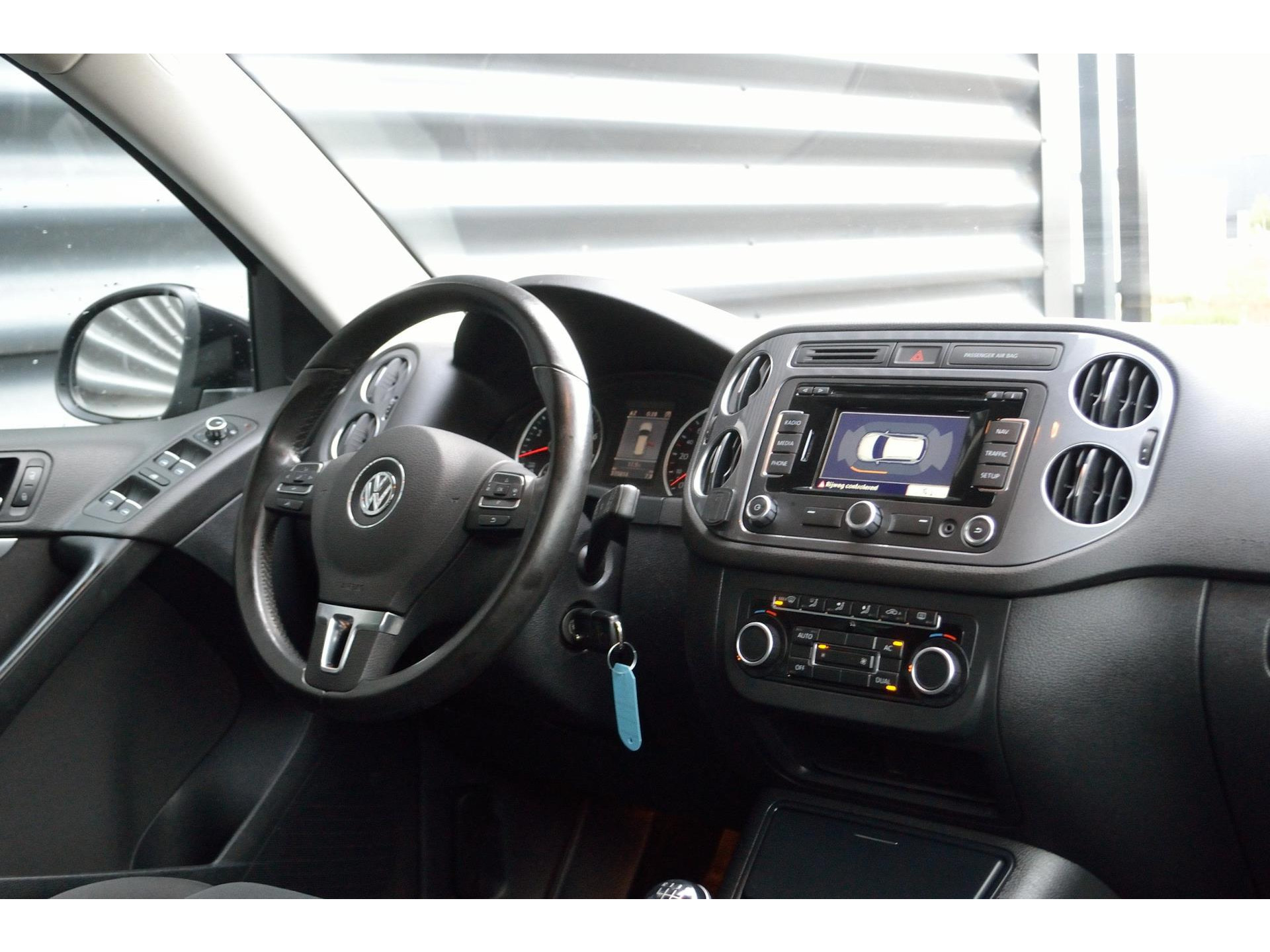 Volkswagen Tiguan 1.4 TSI Sport&Style | Navi | Cruise | NAP | Nette Staat